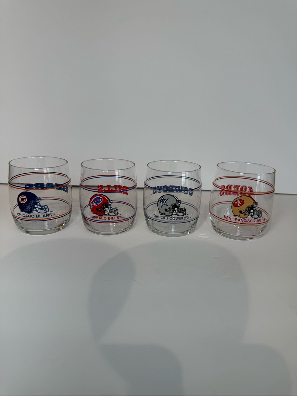 Set of 4 vintage NFL Team Glasses - Bears,Bills,Cowboys,49ers